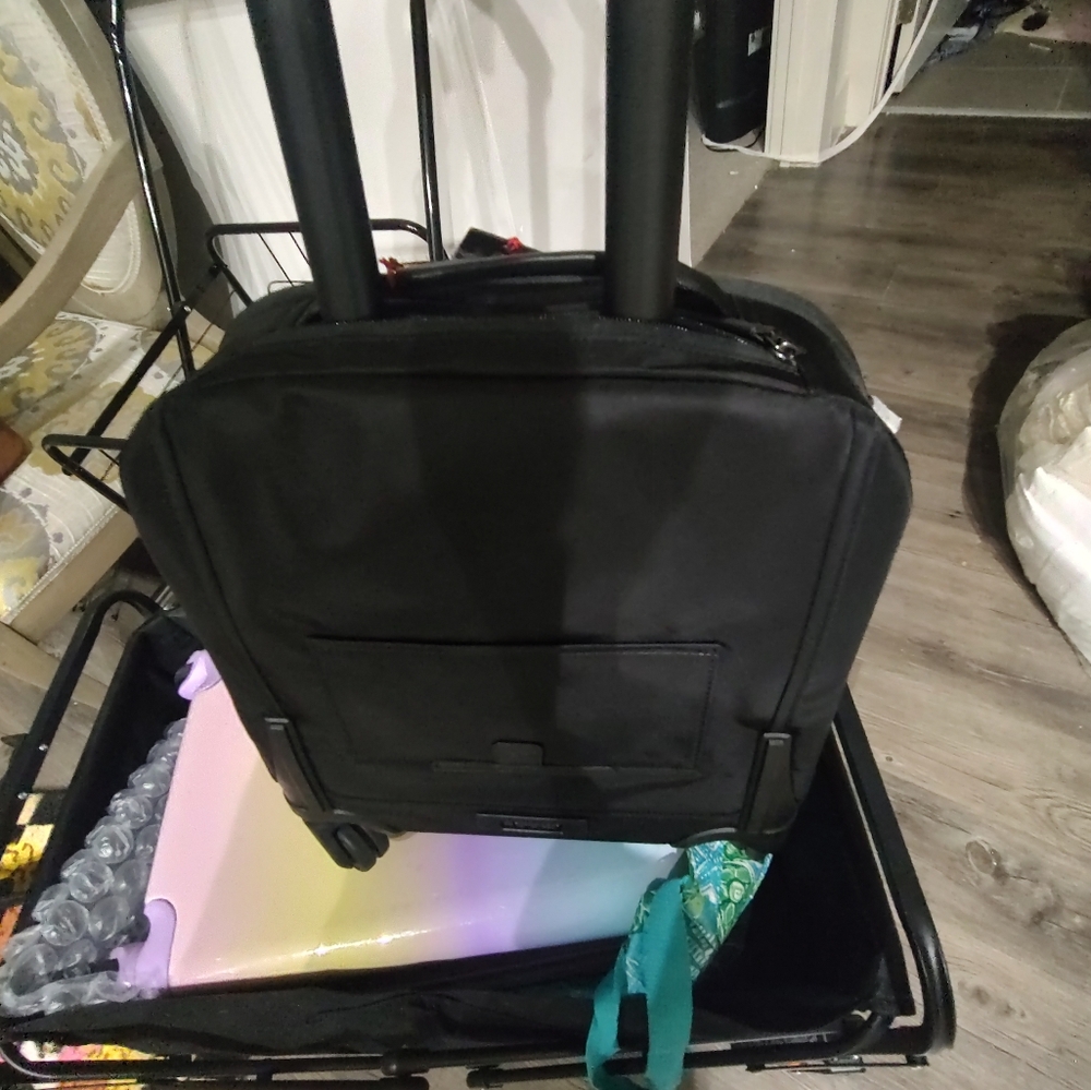 Tumi Black Rolling Travel Bag